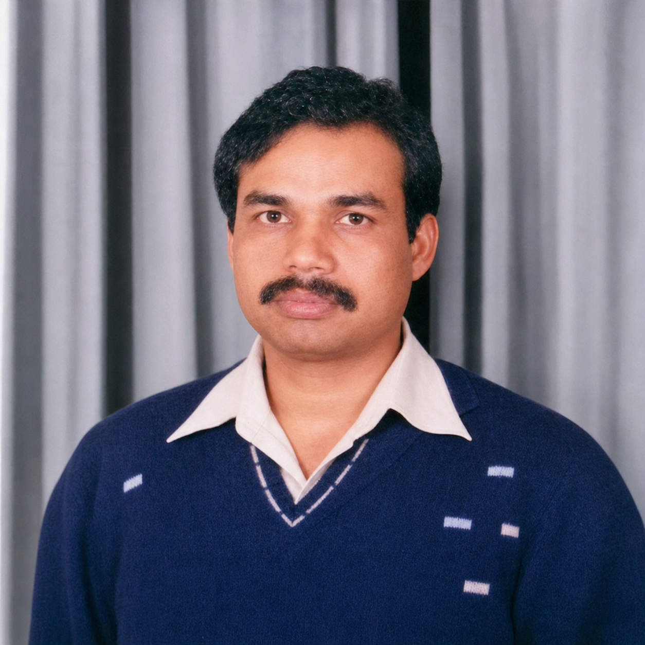 Dr. Mansoor Alam